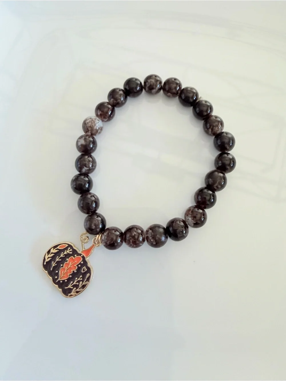Brown Beaded Stretch Bracelet with Pumpkin Charm